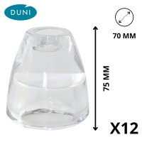 Bougeoir en verre DUNI transparent posé sur une table élégante.