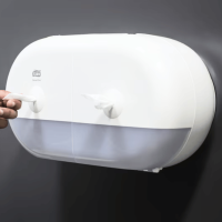 Distributeur Tork SmartOne T9 fixé au mur – usage feuille à feuille hygiénique