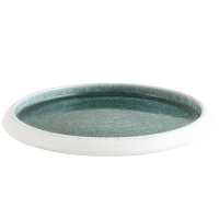 Assiette céramique bleu au profil bas et élégant.
