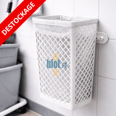 Corbeille à déchets plastique blanche 40 litres fixée au mur dans un local professionnel avec sac poubelle installé