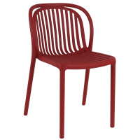 chaise SERENA brique vue trois quarts mettant en avant l’assise ajourée et la structure monobloc pour usage extérieur