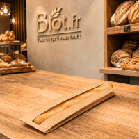 (X1000) – Sac Baguette kraft brun - Fenêtre PP – (12 + 4 X 52 CM) - Disposé à plat sur comptoir d'une boulangerie
